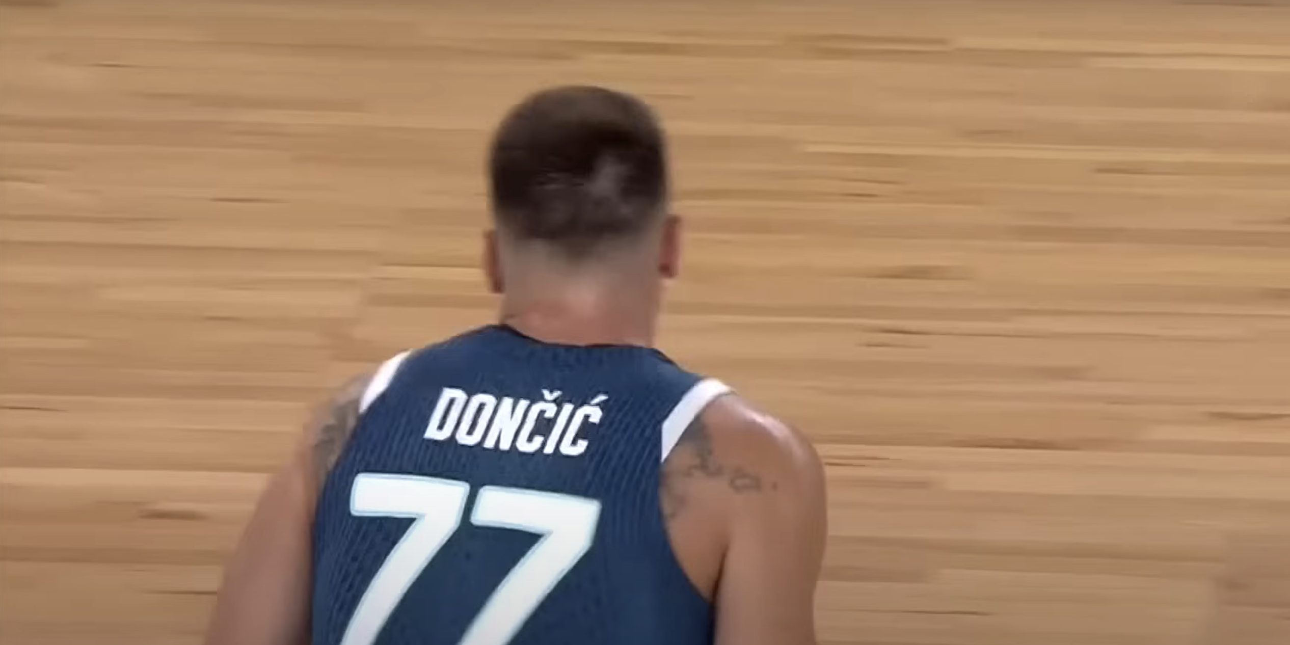 Luka Doncic scores 28 points against Great Britain, showcasing his resilience despite lingering knee concerns.