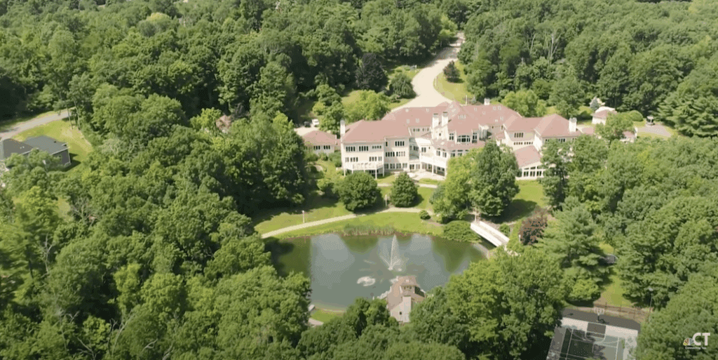 The bizarre and haunting history of Mike Tyson and 50 Cent's former Connecticut mansion, newly listed for $10 million.