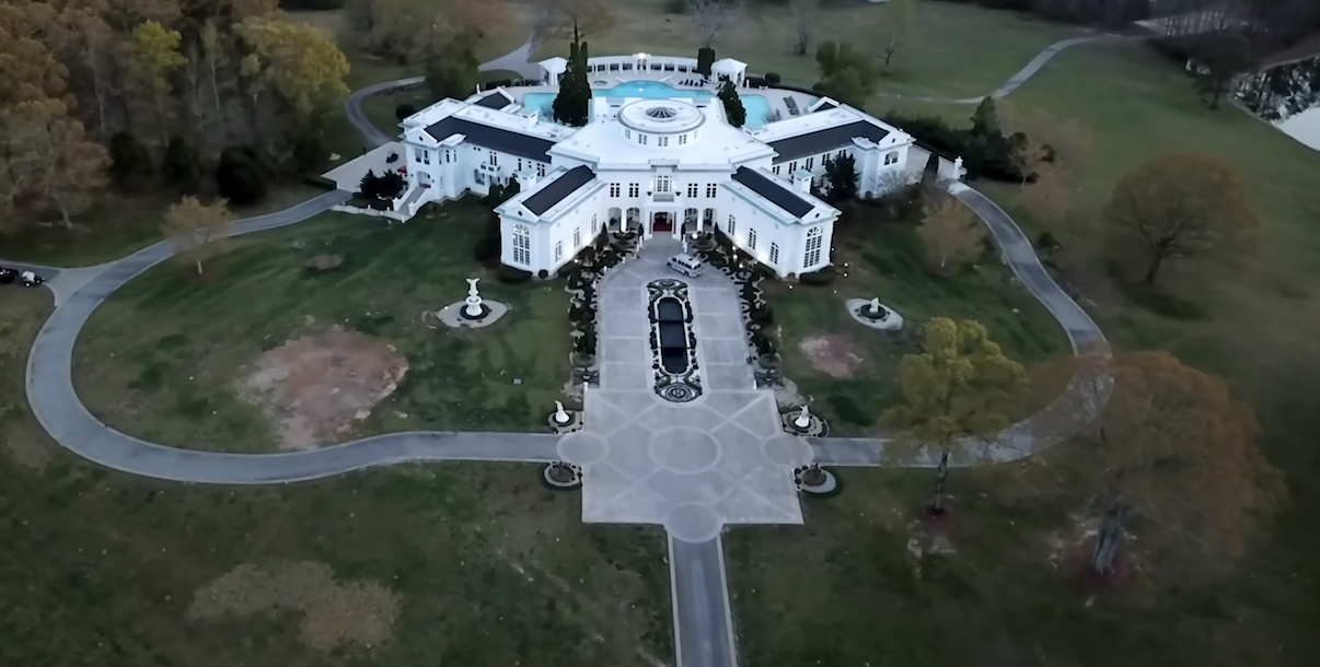 The intriguing saga of Rick Ross' sprawling 300+ acre Georgia estate, once owned by Evander Holyfield before foreclosure took its toll.