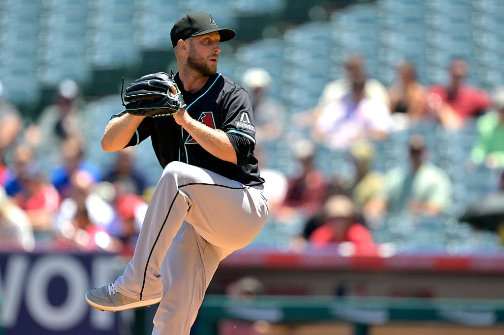 Merrill Kelly opts for the Diamondbacks over the Padres, citing California's burdensome state income tax.