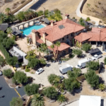 Who really owns the Bachelor mansion, and what is ABC's rental fee for its two annual visits?