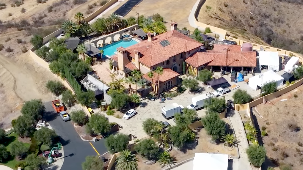 Who really owns the Bachelor mansion, and what is ABC's rental fee for its two annual visits?